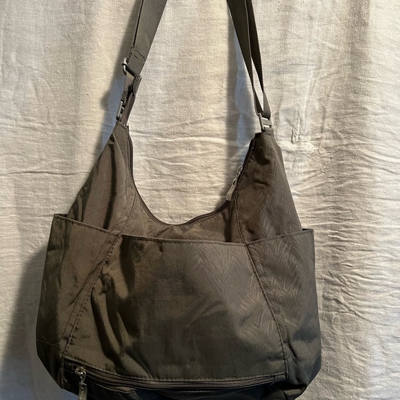 Baggallini Hobo Bag in gray. Lots of pockets. Adjustable strap. Fits lots. - Picture 2 of 6